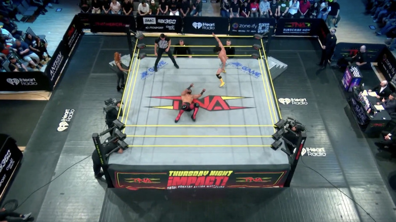 Both men down in the ring