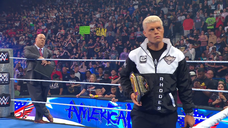 Rhodes in the ring and Heyman on the ring apron