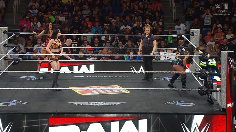 All four women in and around the ring