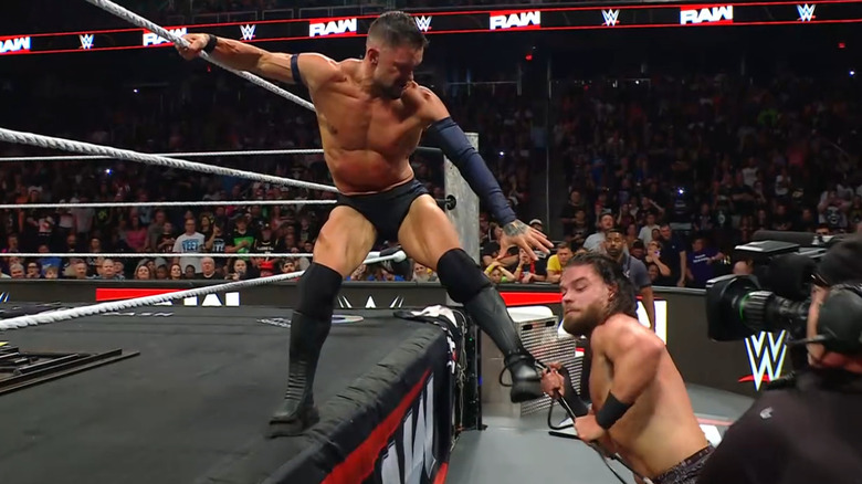 McDonagh using the camera cable to trip Balor