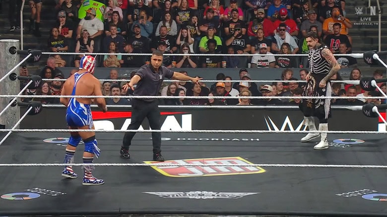 OG Grande and Dominik staring down one another in the ring