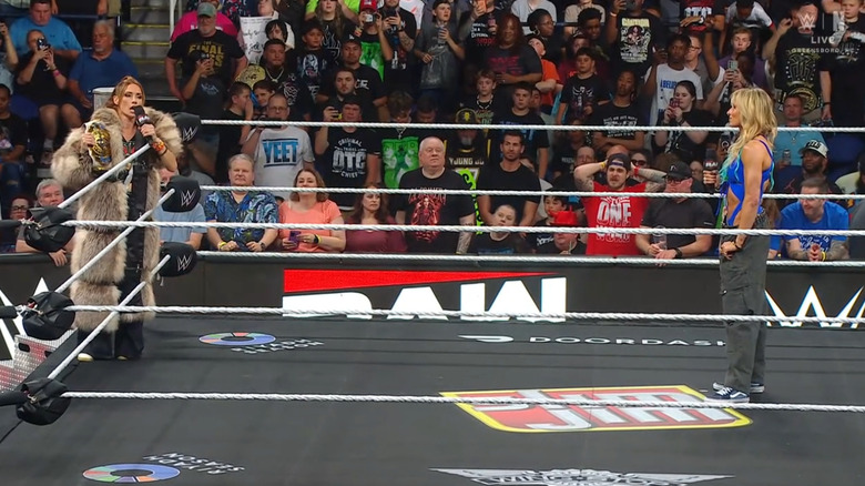Lynch and Ruca staring down one another in the ring