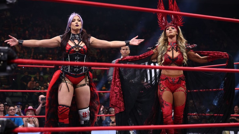 Divine Dominion pose in the ring