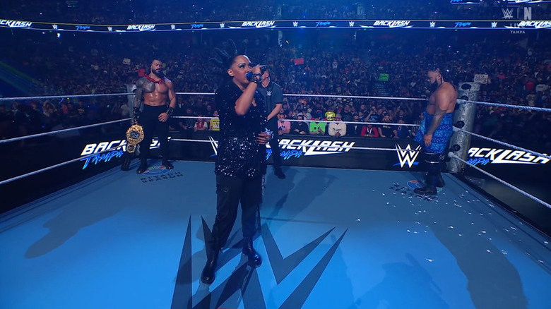 Reigns and Fatu in the ring during the ring announcement