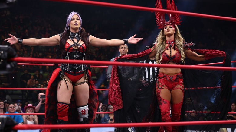 Divine Dominion pose in the ring