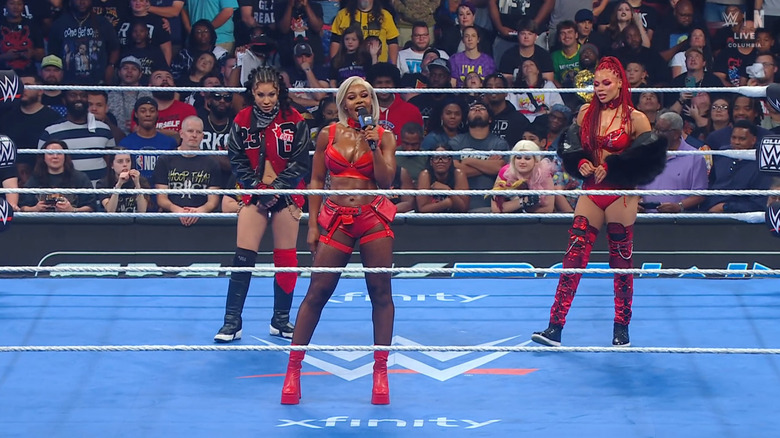 Michin, Cargill, and B-Fab in the ring