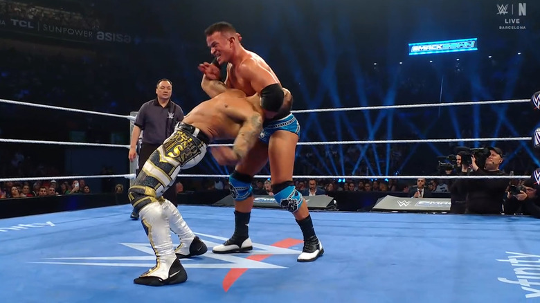Saints with Hayes in a reverse DDT position