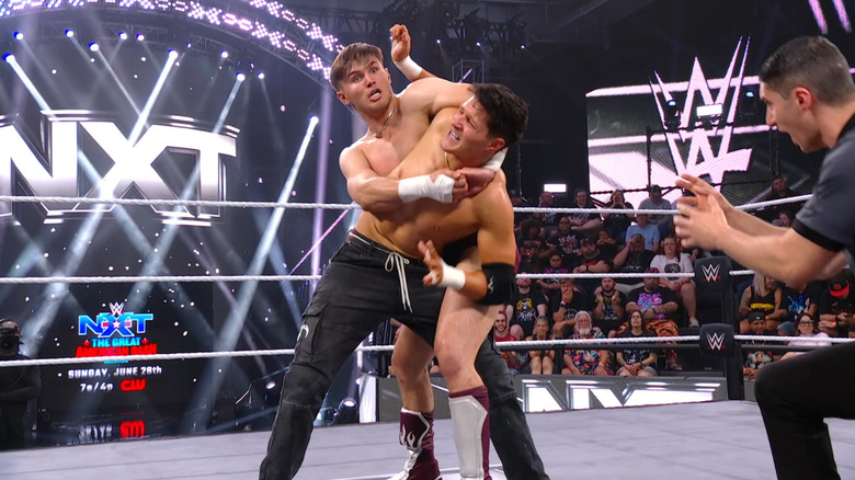 Drake wearing down Wilder with a submission hold