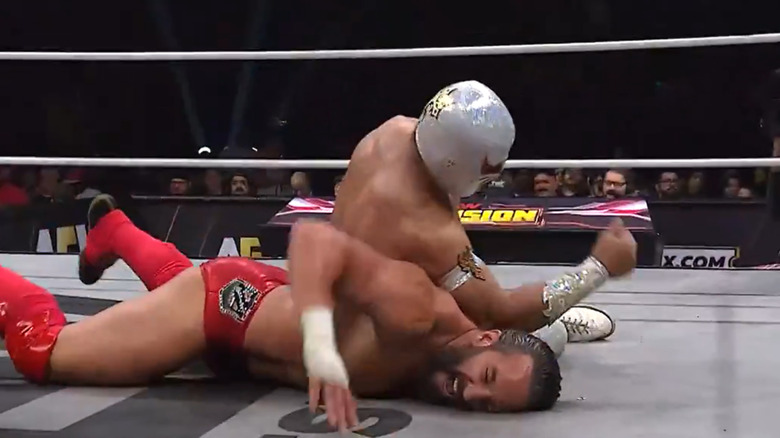 Mistico wrestles Tony Nese
