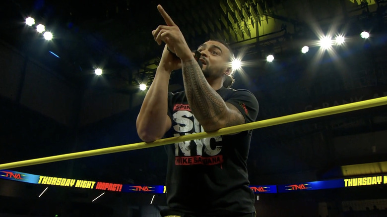 Santana talking at the top of the entrance ramp
