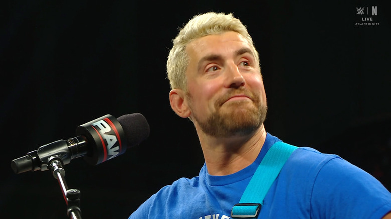 Hendry in the ring with his microphone