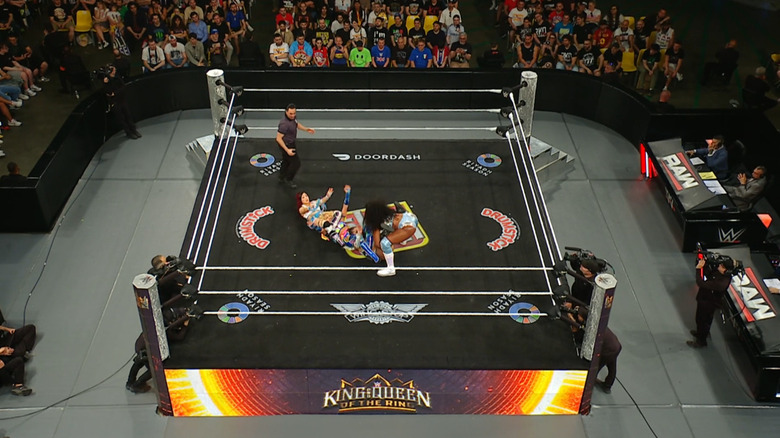 All four women inside the ring