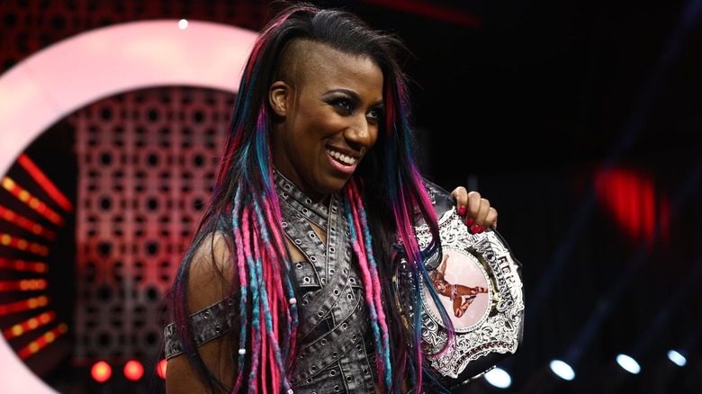 Athena posing with the ROH Women's Championship