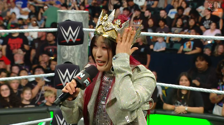SKY in the ring with her Queen of the Ring crown