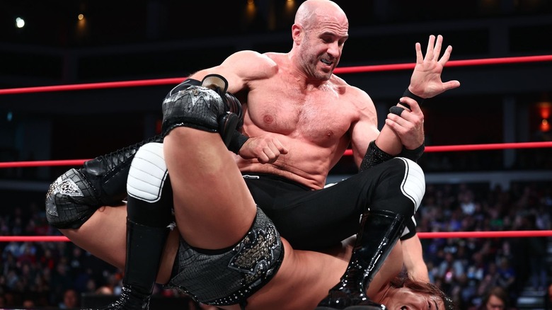 Claudio Castagnoli puts Konosuke Takeshita in a submission