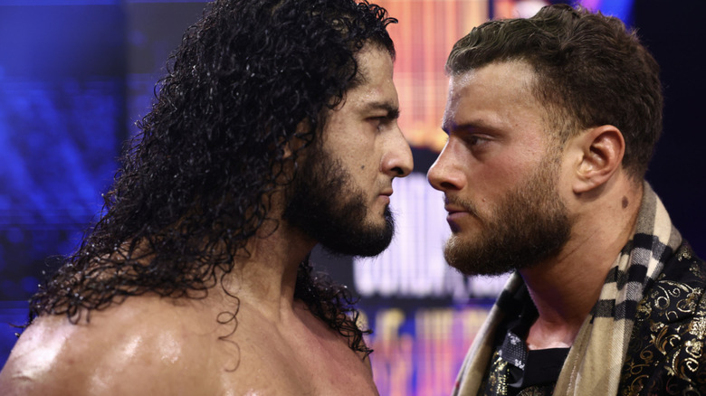 Rush and MJF staring one another down