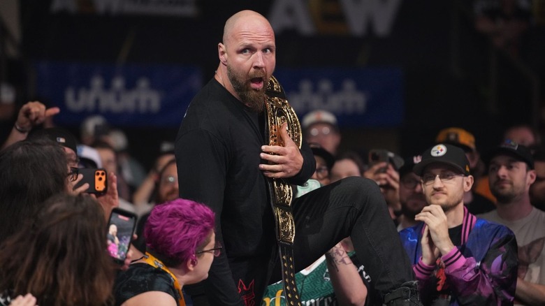 Jon Moxley with the Continental title over his shoulder