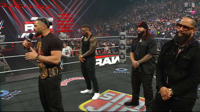 Reigns, The Usos, and Fatu in the ring