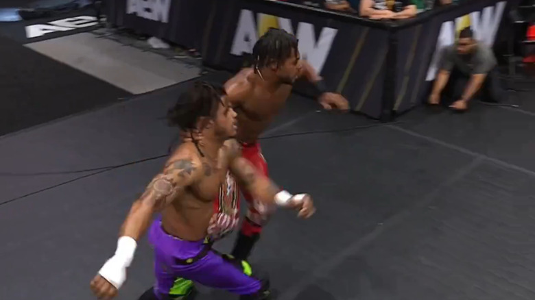 Kevin Knight grapples with Dezmond Xavier