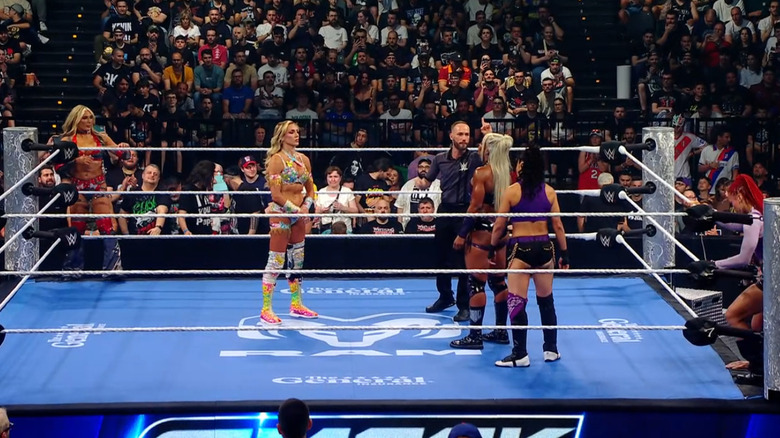 All four women in and around the ring