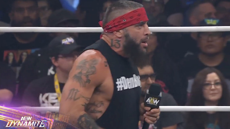 Briscoe talking in the ring