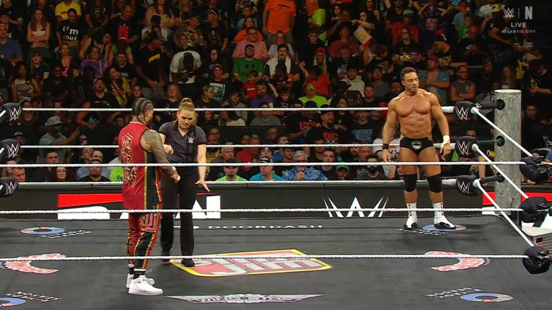 Jimmy and Knight both staring down one another in the ring