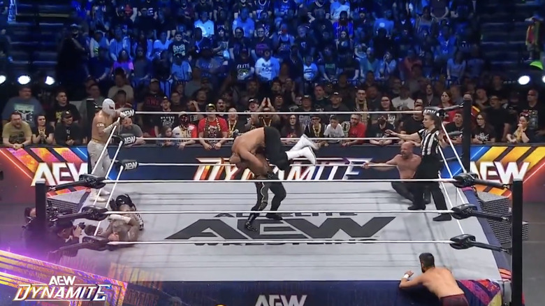 All six men in and around the ring
