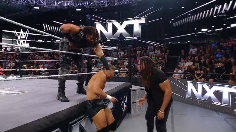 Troy dragging Lennox back in the ring