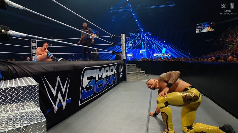 Saints in the ring and Hayes on the outside