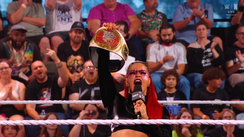 Zaria holding up her Women's North American Championship