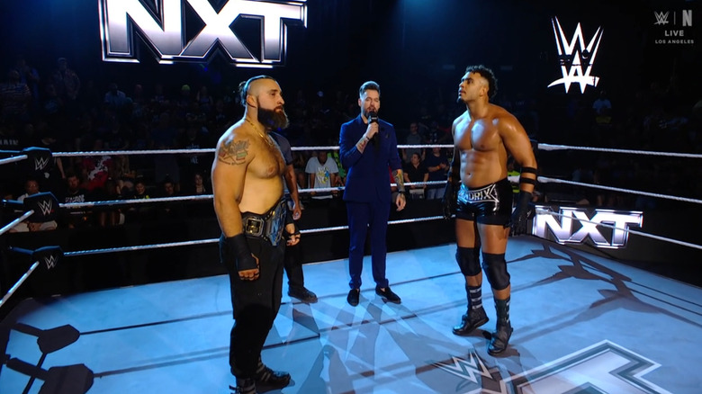 The pair staring down one another during the ring announcement