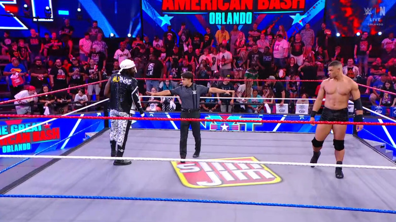 Shugars and Lennox staring down one another in the ring