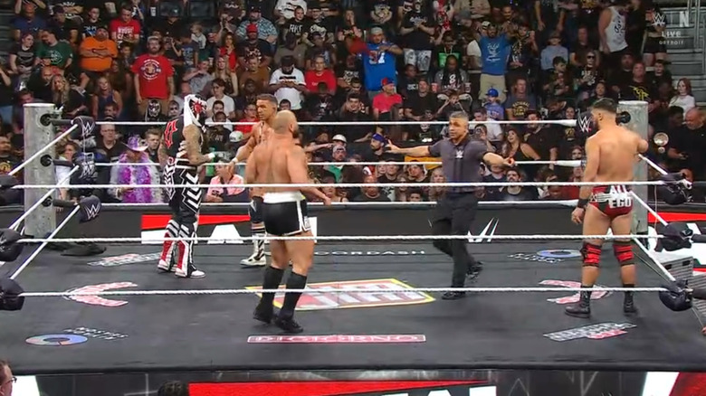 All four men inside the ring