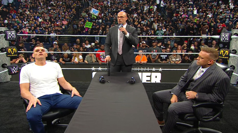 GUNTHER, Pearce, and Aldis all in the ring