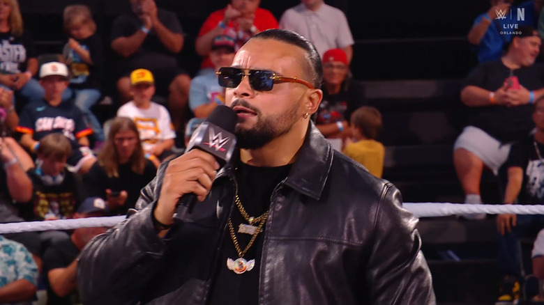 Santana talking inside the ring