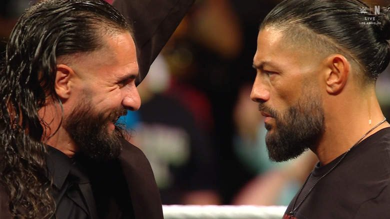 Rollins and Reigns staring one another down