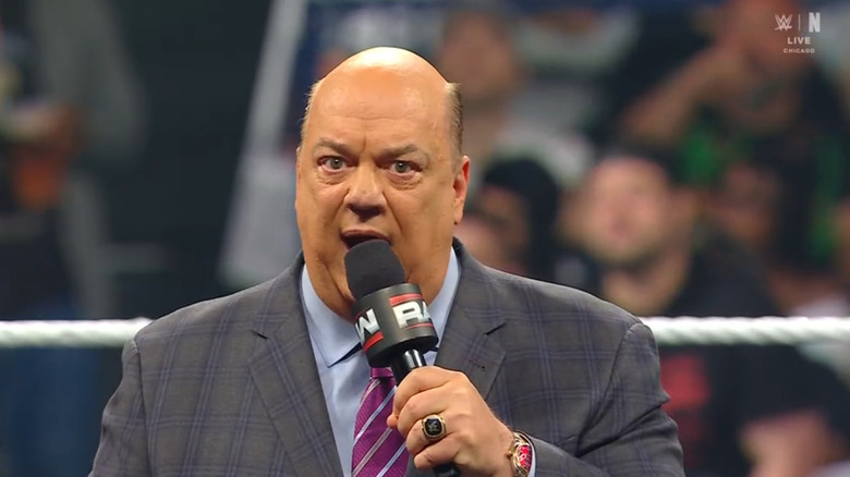 Heyman speaking in the ring