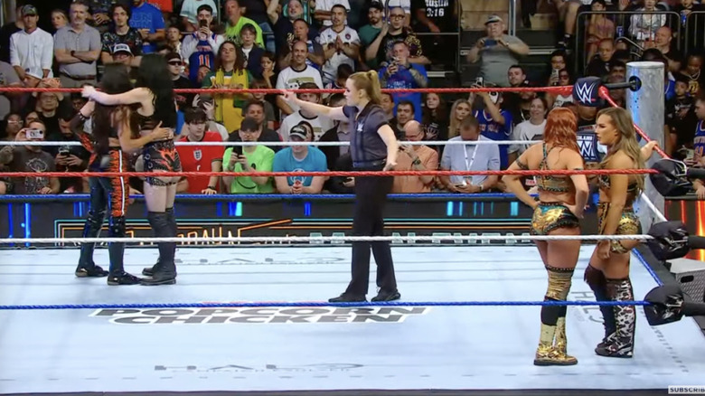 All four women inside the ring