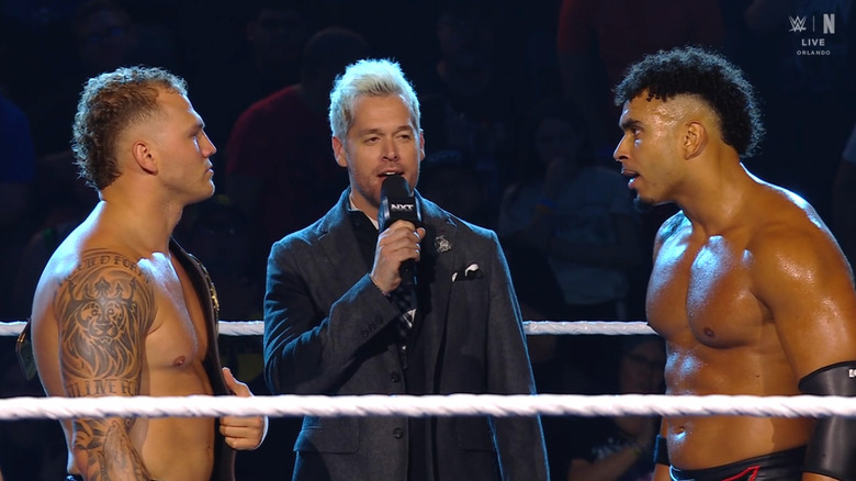 Borne and Hendrix staring down one another in the ring