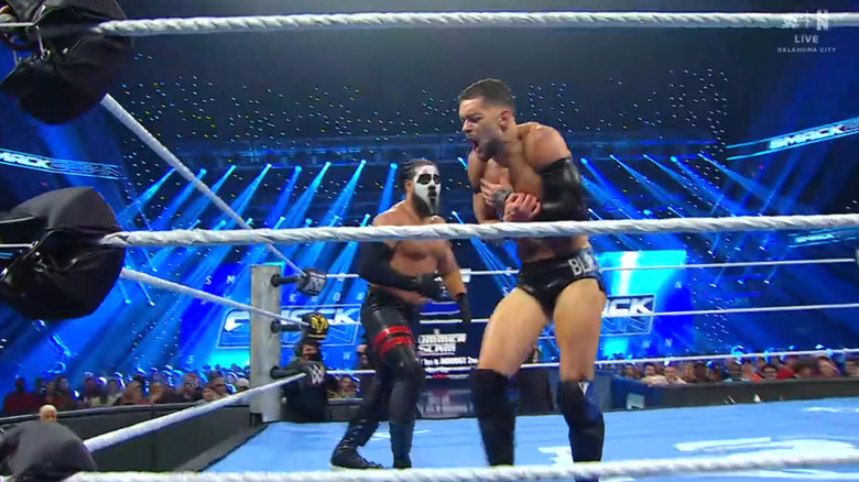 Tama and Balor inside the ring