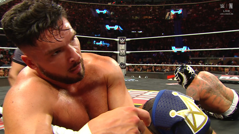 Page and Rey both inside the ring
