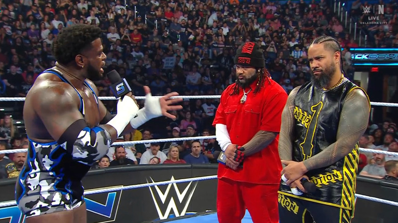 Keys, Fatu, and Jimmy all in the ring