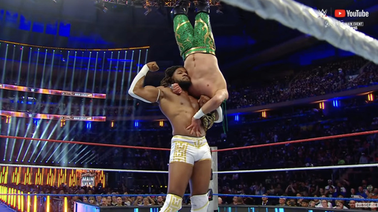 Williams with Kid in a delayed vertical suplex position