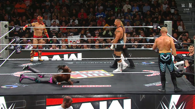 All four men in and around the ring