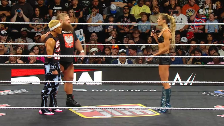 Tozawa and Otis talking with Dupri