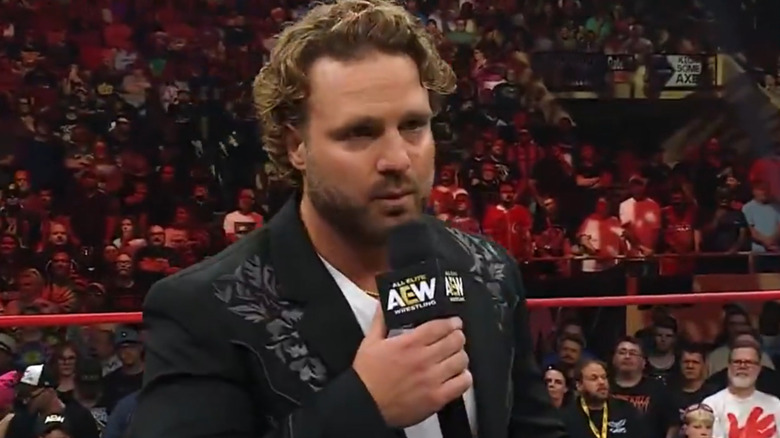 "Hangman" Adam Page talks in the ring