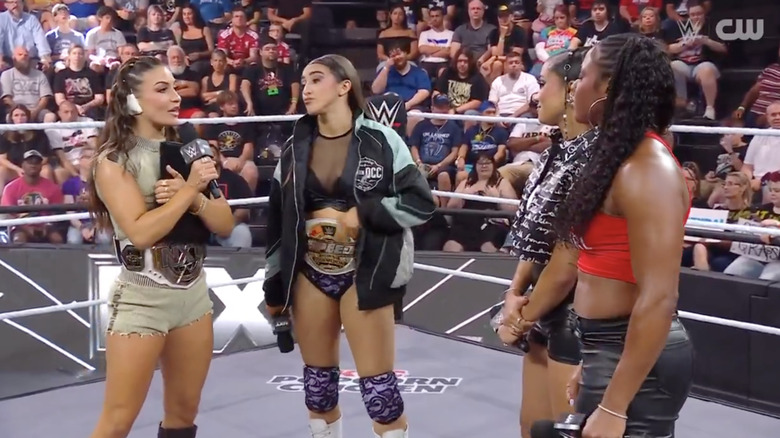 Sinclair, Grey, Jordan, and Armstrong all in the ring
