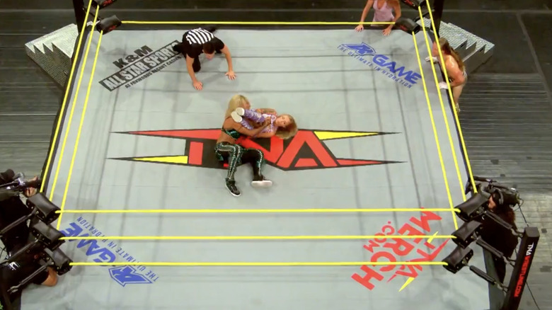 Heather with an armbar cinched in on Sadè