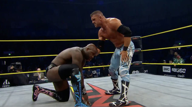Kazarian standing over Moose