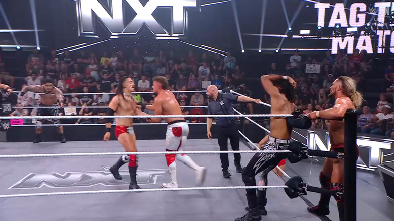 Several competitors in and around the ring